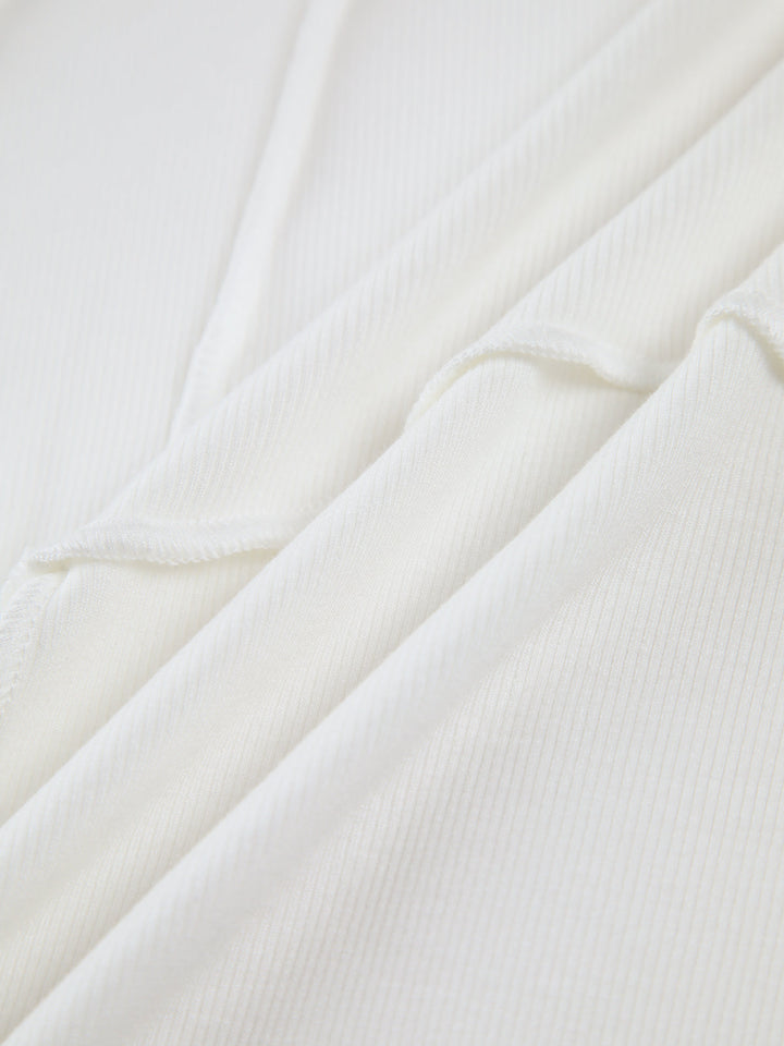 Freja | Elegant ribbed long-sleeve top with tailored piping
